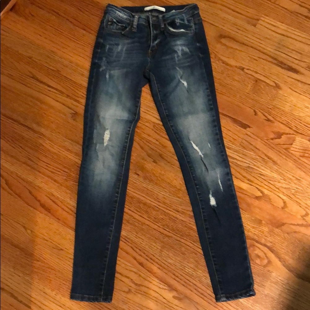 Dark washed ripped skinny jeans